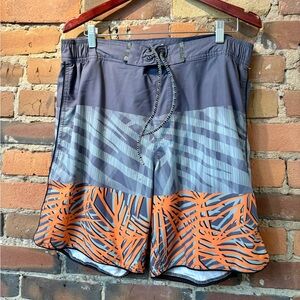 Men’s Vintage Point Zero Orange & Blue Swim Shorts. Size: Large